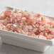 A bowl of Regal Extra Coarse Grain Pink Himalayan Salt.