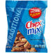 A blue bag of Chex Mix Traditional on a white background.