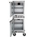 A Beverage-Air stainless steel undercounter freezer with two left hinged doors open.
