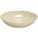 A white bowl with a speckled surface.