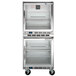 A Beverage-Air stainless steel dual temperature undercounter refrigerator and freezer with glass doors on wheels.