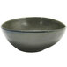 A Front of the House Kiln porcelain bowl with a white background and dark gray rim.
