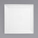 A Front of the House white square porcelain plate with a square spiral design.