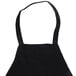 A black Chef Revival bib apron with straps and a pocket.