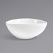 A case of two Front of the House Kiln superwhite oval tall porcelain bowls on a white background.