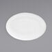 A white porcelain oval coupe plate with a spiral pattern.