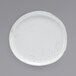 A white Front of the House Artefact porcelain plate with brown specks.