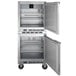 A stainless steel Beverage-Air undercounter refrigerator with two doors open.