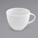 A white Front of the House porcelain cup with a handle.