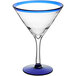 A clear martini glass with a blue rim and base.