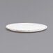 A white Front of the House Artefact porcelain plate with a gold rim.