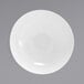A white porcelain bowl with a circular spiral pattern.