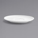 A Front of the House white porcelain bouillon saucer with a spiral rim.