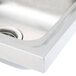 A stainless steel Advance Tabco hand sink with a center drain.