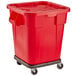 A red Rubbermaid BRUTE trash can with wheels.
