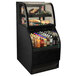 A black Structural Concepts refrigerated dual service merchandiser with food and drinks inside.