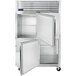A silver Traulsen G Series reach-in refrigerator with a door open.