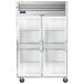 A white Traulsen G Series reach-in refrigerator with glass doors.