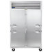 A Traulsen G Series reach-in freezer with right and left half doors.