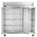 A white Traulsen G Series reach-in refrigerator with shelves.