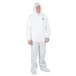 A man wearing a white Cordova disposable microporous coverall suit.