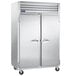 A large silver Traulsen G Series refrigerator with two doors.