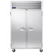 A large silver Traulsen G Series reach-in refrigerator with two doors.