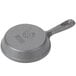 An American Metalcraft pre-seasoned mini cast iron skillet with a handle.