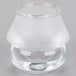 A clear glass container with a clear top on a Sterno 3 1/2" Frost Shade Lamp.