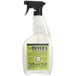 A Mrs. Meyer's Clean Day Lemon Verbena Tub and Tile Cleaner spray bottle with a green label and black sprayer.