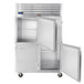A Traulsen G Series reach-in refrigerator with open half doors.
