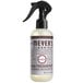 A white Mrs. Meyer's Clean Day spray bottle with a brown label and black cap.