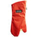 A red San Jamar oven mitt with a black label.