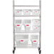 A metal shelving unit with Rubbermaid plastic ingredient bins.