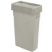 A beige rectangular Carlisle Trimline trash can with a lid.