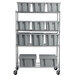 A grey Rubbermaid Palletote container on a metal shelf.