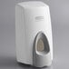 A white Rubbermaid manual foam soap dispenser with grey accents.