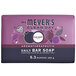 A purple Mrs. Meyer's Clean Day Plum Berry bar soap on a counter.