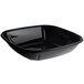 A black square Fineline PET plastic bowl with a clear lid.
