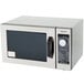 A stainless steel Panasonic commercial microwave with a black screen.