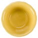 A close up of a yellow bowl with a white background.