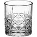 An Acopa Evora old fashioned glass with a diamond pattern.