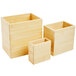 Three natural bamboo risers with handles and lids.