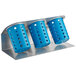 A Steril-Sil stainless steel flatware organizer with three blue perforated plastic cylinders.
