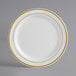 A white plate with gold trim.