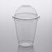 A Choice clear plastic cup with PET dome lid.