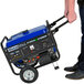 A man using a DuroMax portable generator.