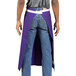 A person wearing a purple Uncommon Chef Marvel bistro apron with natural webbing.