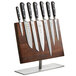 A Mercer Culinary Renaissance knife set on a wooden stand.