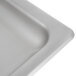 A white rectangular stainless steel feed pan with a funnel-shaped opening.